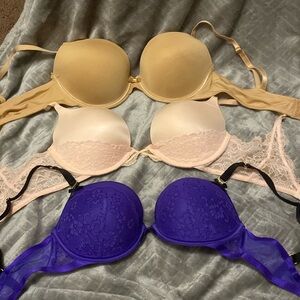 Three pairs of bras